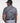 Man wearing the Frenzy athletic golf polo by Ferret, with bold geometric line pattern in multiple directions and lightweight fabric. Golf polo