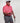Man in the Pink Lines Ferret golf polo, featuring pink fabric with square line patterns and a comfortable athletic cut.