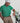 Man on the golf course wearing the Dots Ferret polo, showcasing small white ball pattern on a breathable DryFleX fabric.